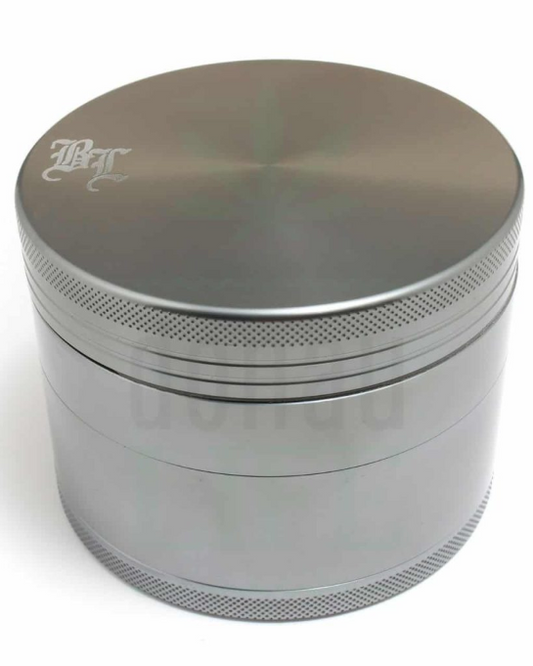 Silver metal grinder with visible Black leaf branding on top