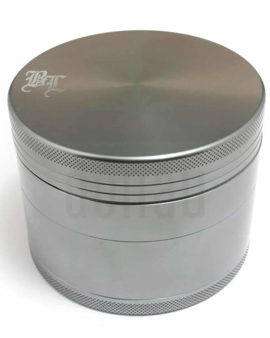 Silver metal grinder with visible Black leaf branding on top